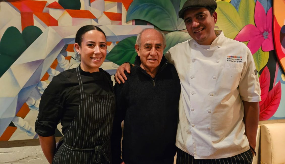 Mercadito Collaboration with the International Latino Cultural Center of Chicago - Pepe Vargas poses with Executive Chef Carlos Garza and Chef Zoey Bryant