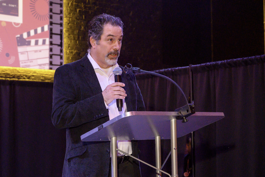 Newly Appointed Executive Director of the International Latino Cultural Center Mateo Mulcahy speaks to the audience at the 42nd Chicago Latino Film Festival Kick Off Party in April.