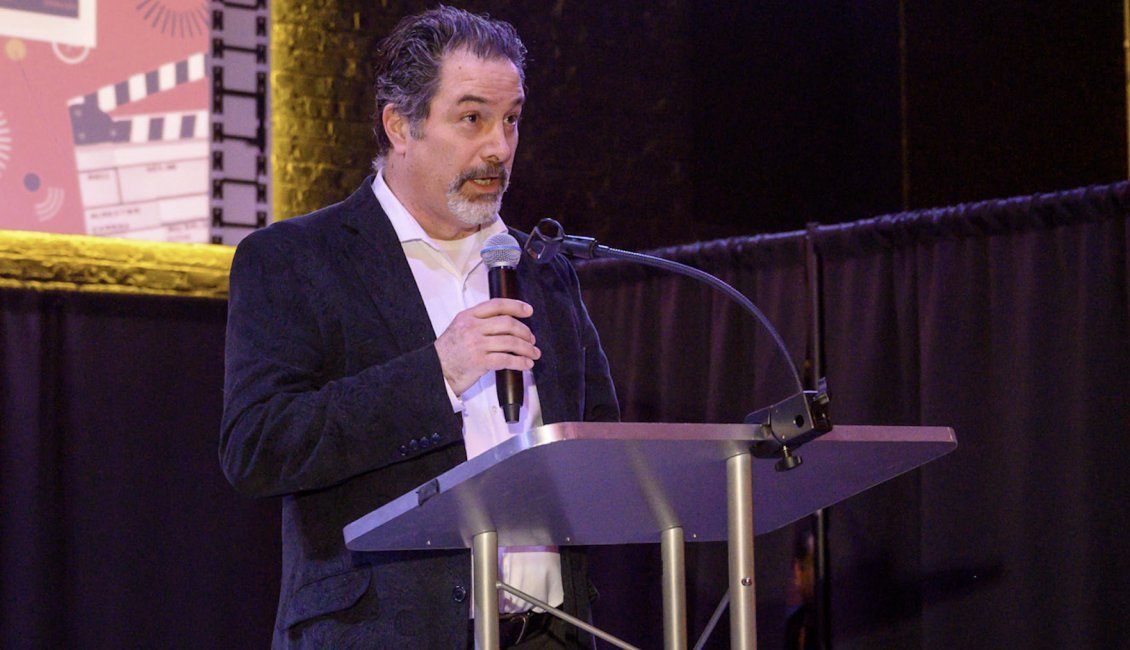 Newly Appointed Executive Director of the International Latino Cultural Center Mateo Mulcahy speaks to the audience at the 42nd Chicago Latino Film Festival Kick Off Party in April.