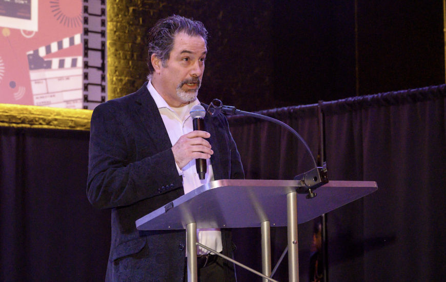 Newly Appointed Executive Director of the International Latino Cultural Center Mateo Mulcahy speaks to the audience at the 42nd Chicago Latino Film Festival Kick Off Party in April.